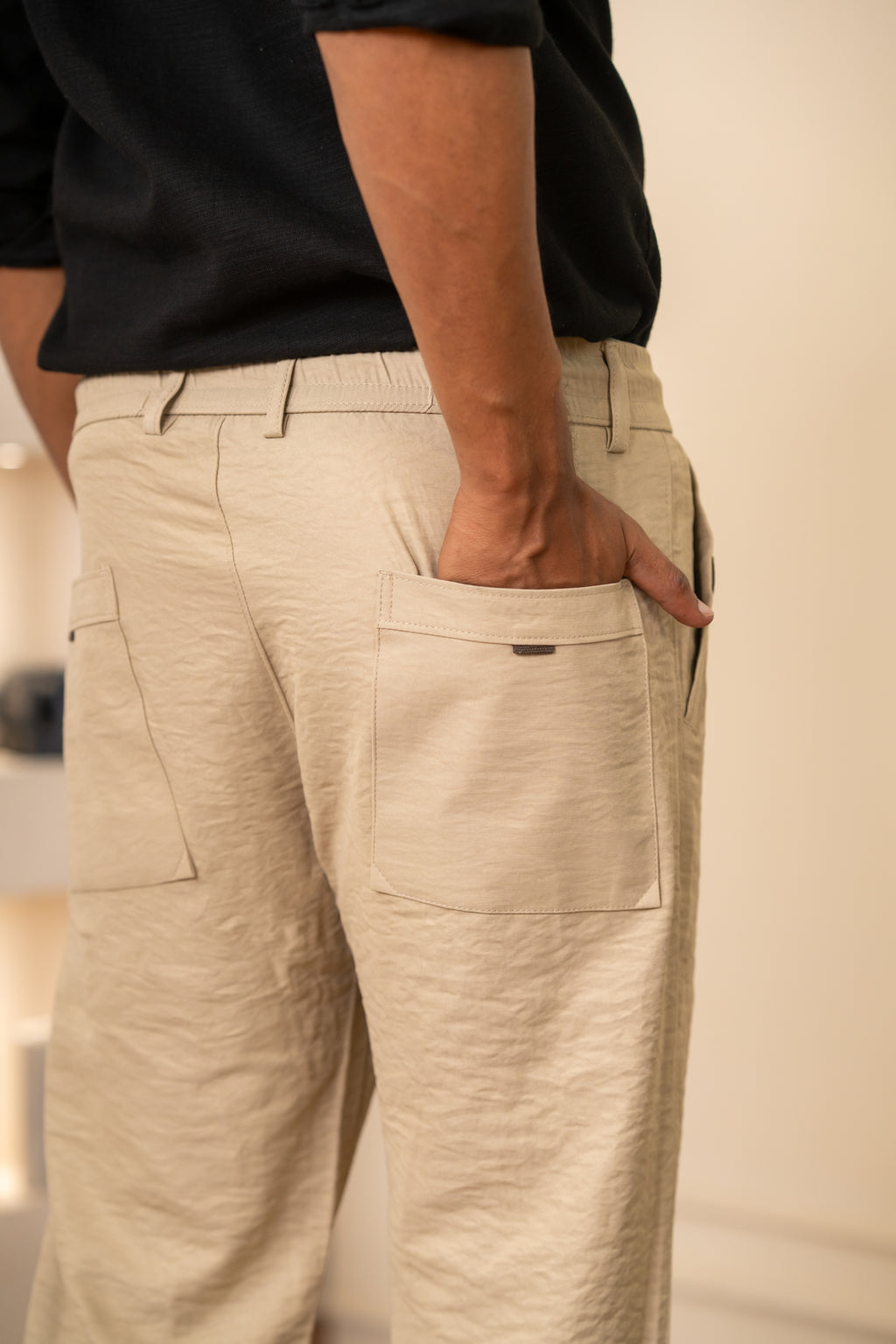 Beige Pleated Relaxed Trousers